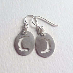 Recycled sterling silver otter earrings